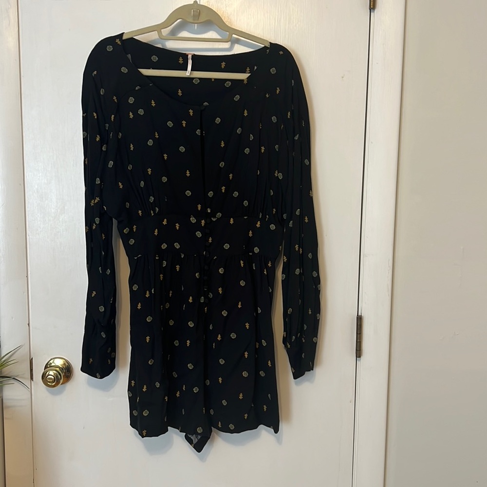 Free people size large long sleeve black romper